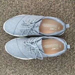 Super cute Tom's, lace up sneakers. Grey with white bottoms